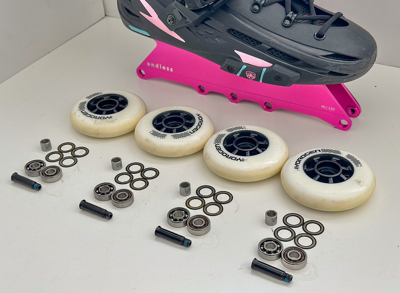 Photo 3: Inline skates with spare wheels and bearings
