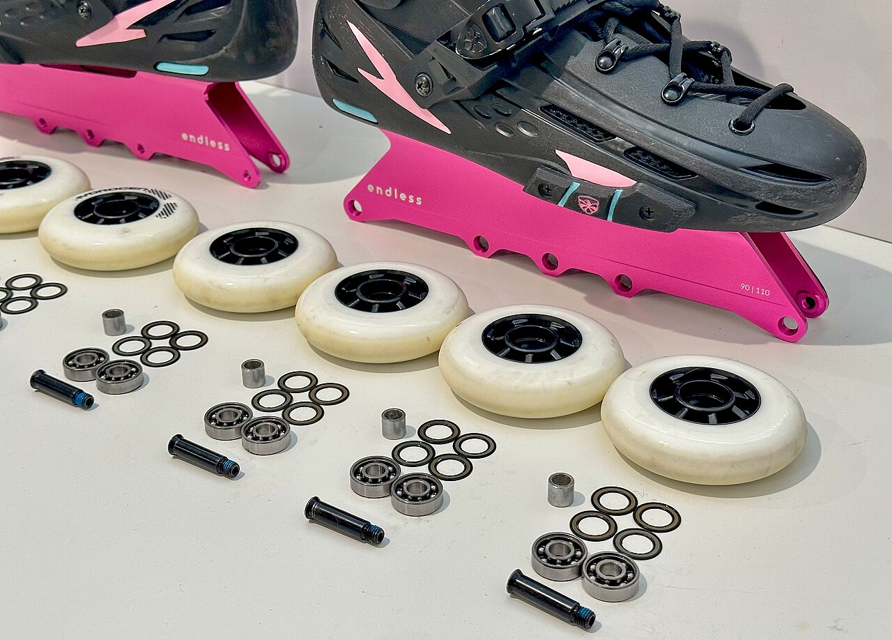 Photo 2: Inline skates with spare wheels and bearings
