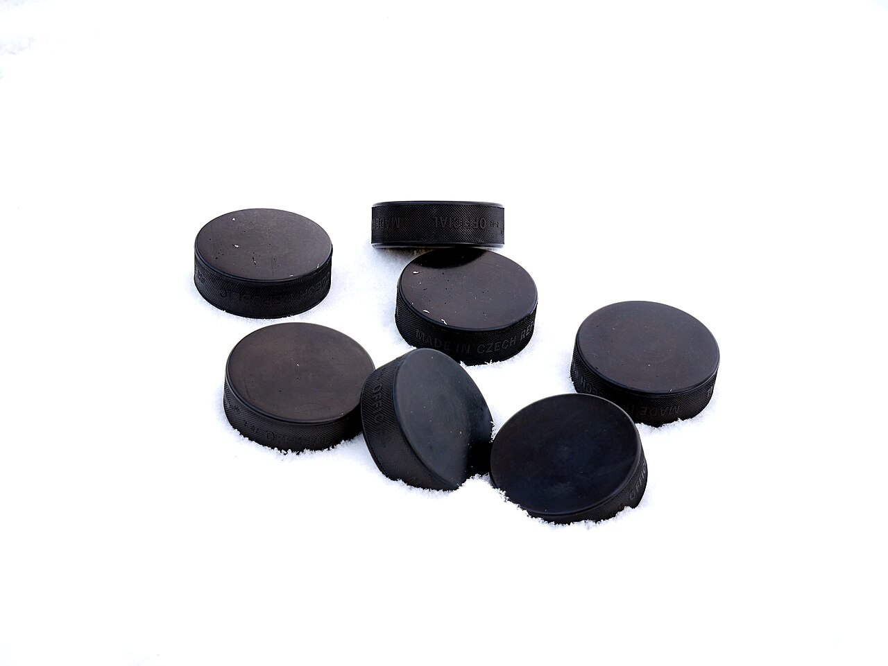Official game pucks, six
